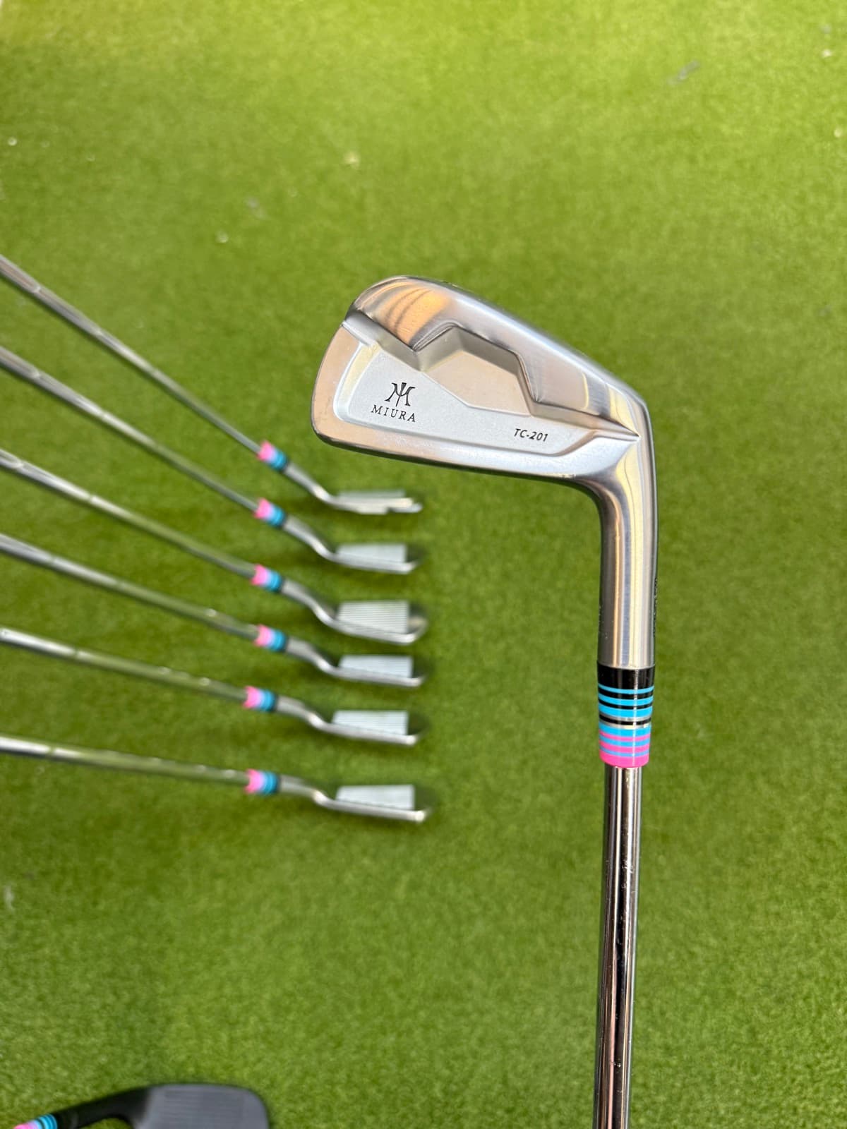 Close-up of a Miura iron head hosel with custom whipping detail