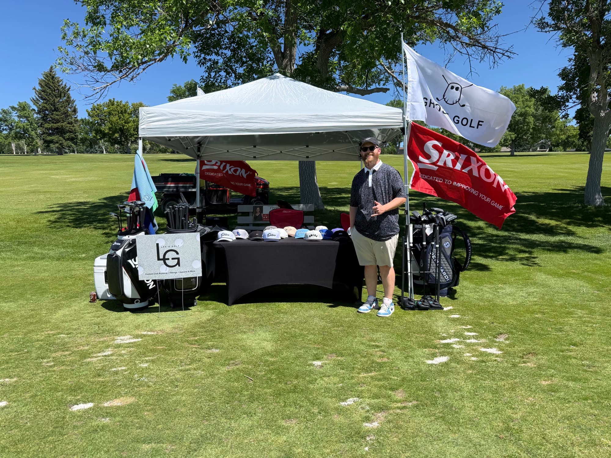 Hayden Lee at the Lee's Golf vendor booth at a golf course event